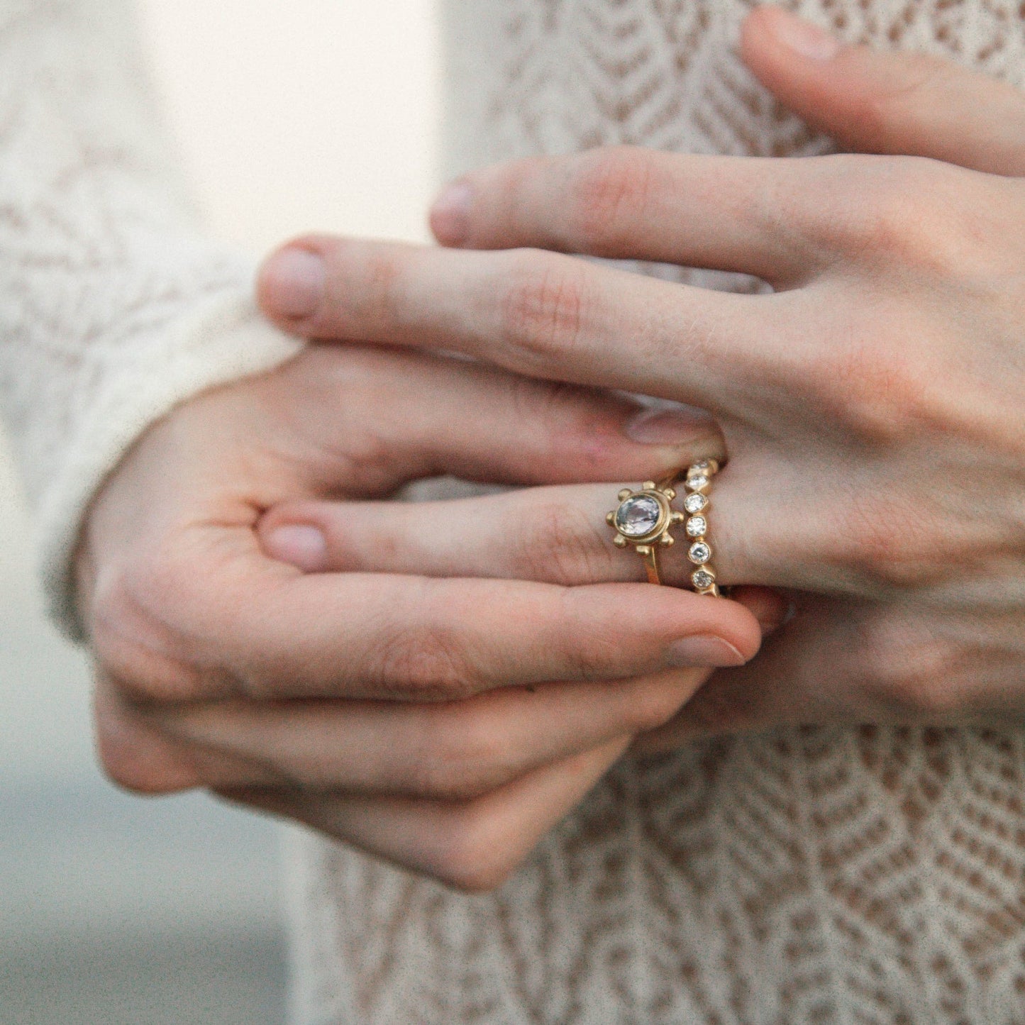 Close-up of 14K gold diamond eternity ring showing individual stone details