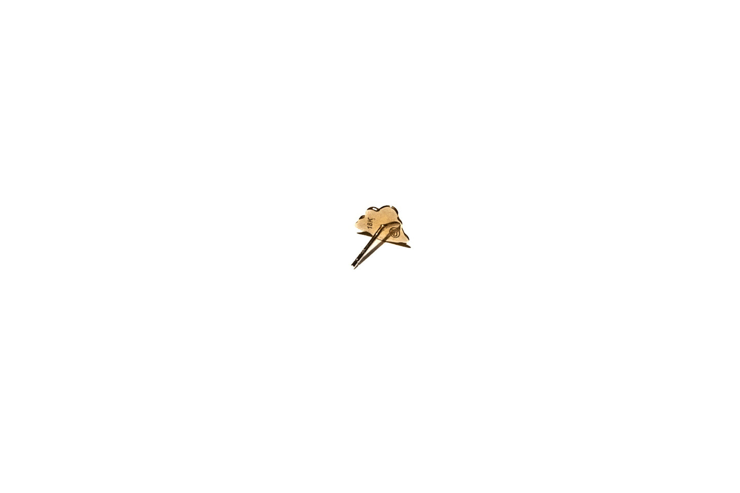 Overhead view of pair of dreamy gold nebulous studs
