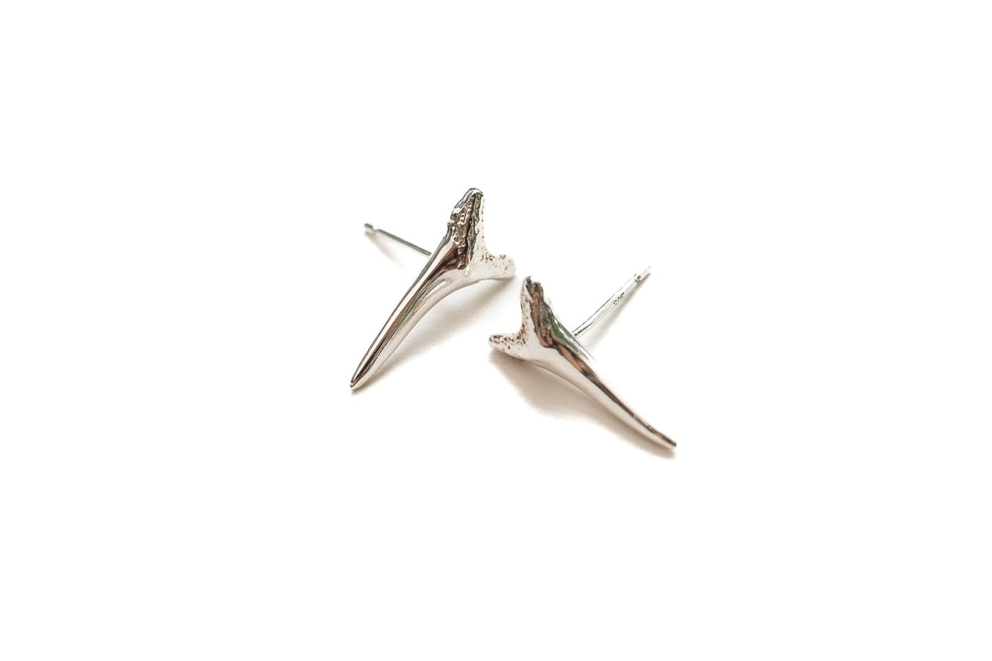 Sterling silver shark tooth stud earrings in small and large sizes, moonlit collection