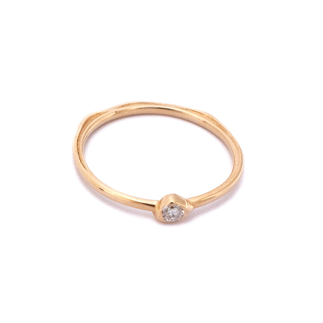 Waterline Diamond Ring in 14K yellow gold with a natural diamond on a white background