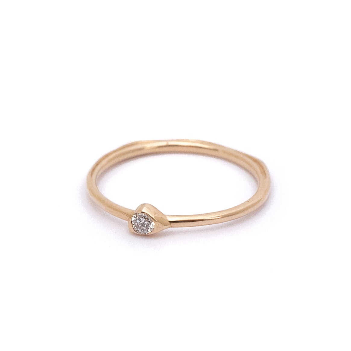 Waterline Diamond Ring in 14K yellow gold with a natural diamond on a white background