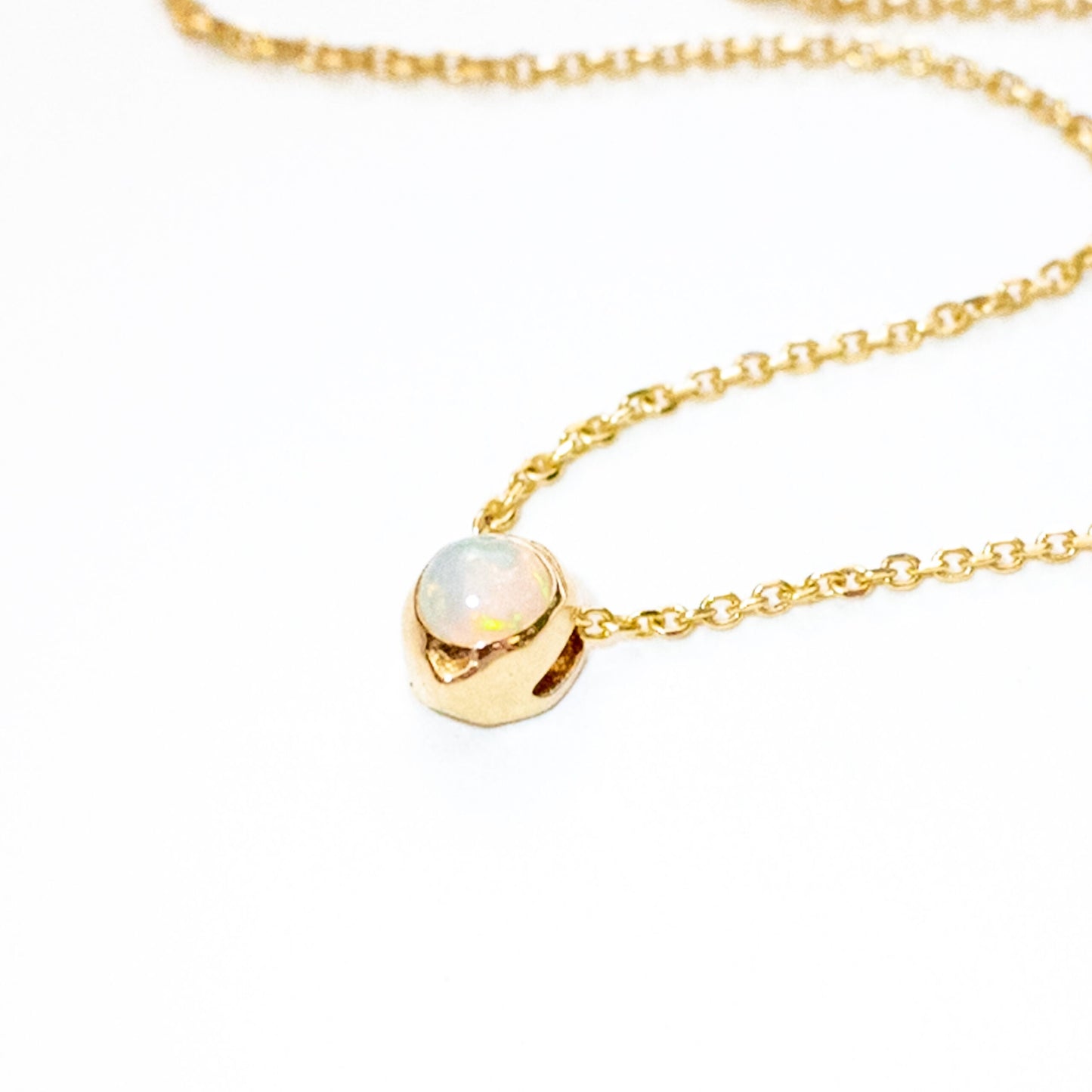 14K gold oceanus opal slide pendant with natural iridescent opal gemstone