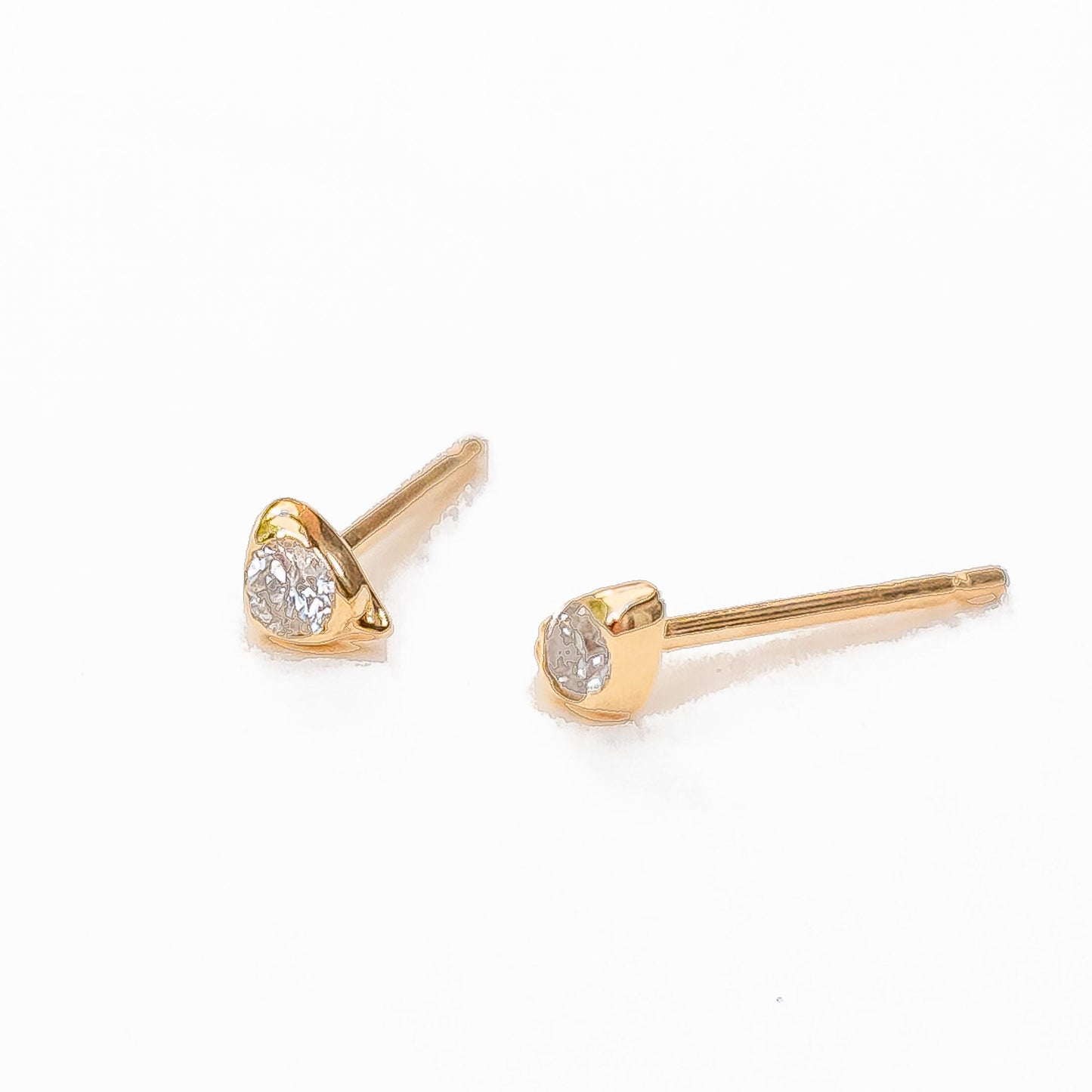14K gold sea stone diamond stud earrings with organic wave-like setting design