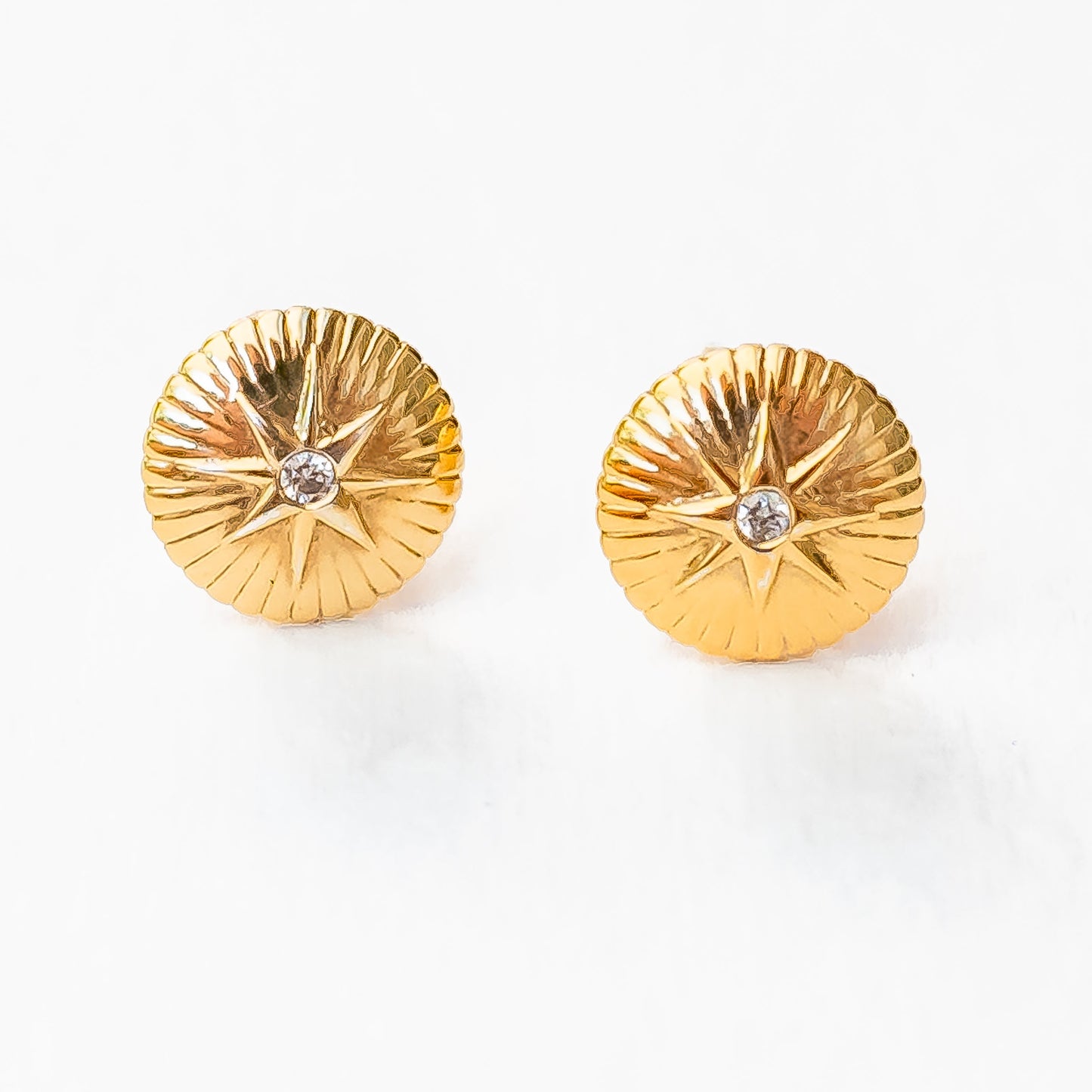 Model ear wearing nova diamond studs, everyday luxury jewelry photography