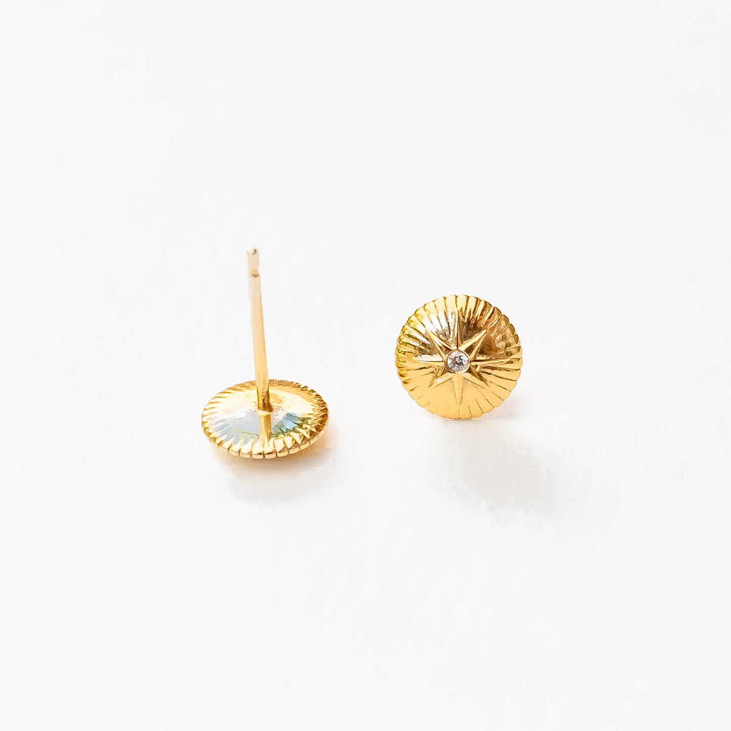 Close-up of classic diamond stud showing brilliant sparkle and secure setting